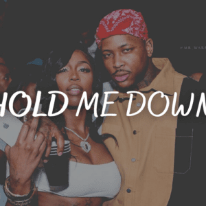 A man wearing a red bandana and a woman with long hair pose together at an event, exuding a strong connection. The man wraps his arm around her shoulder, capturing the essence of the moment with the phrase "Hold Me Down," displayed in large, white letters.
